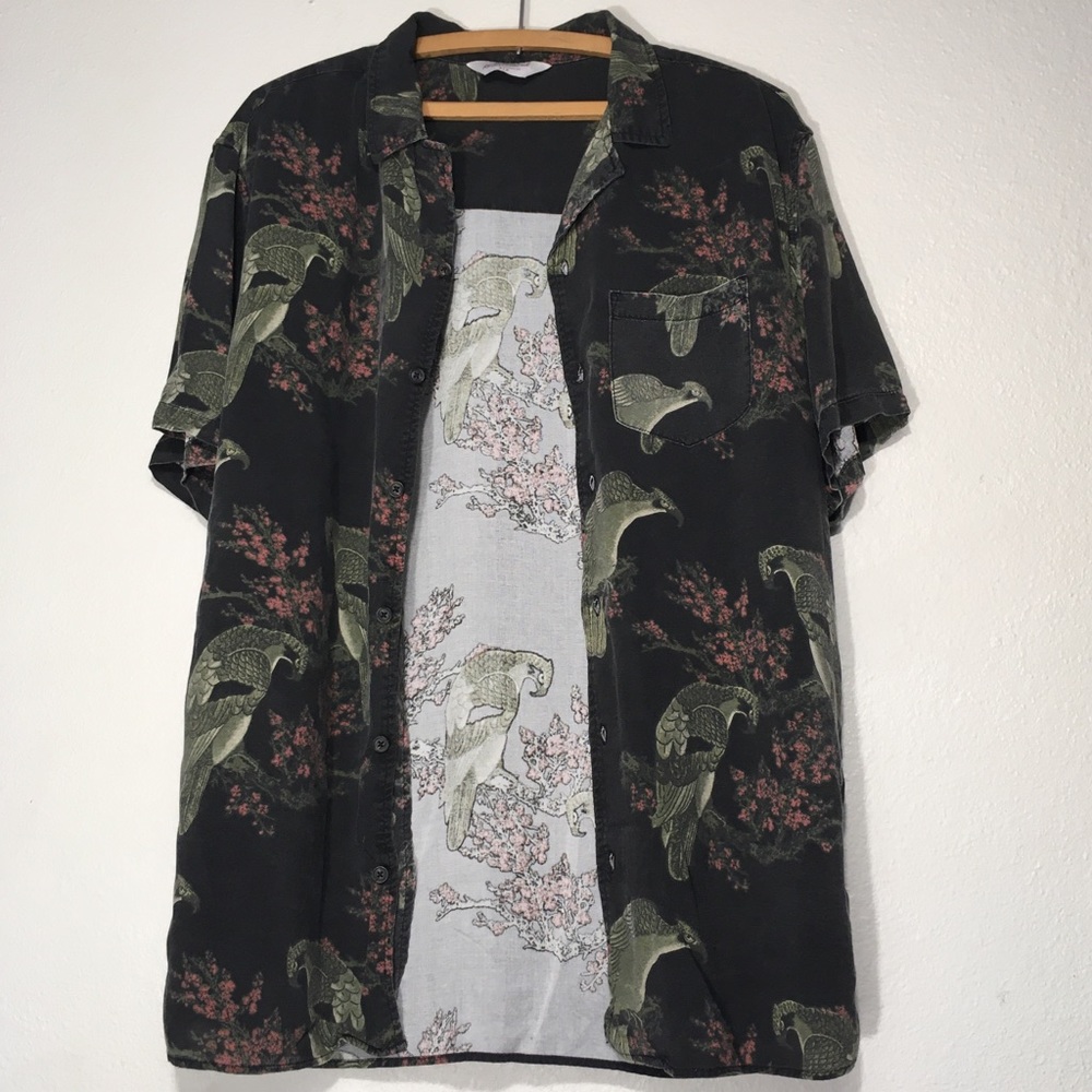 Beautifully colored button down with a pink floral pattern and hawks.